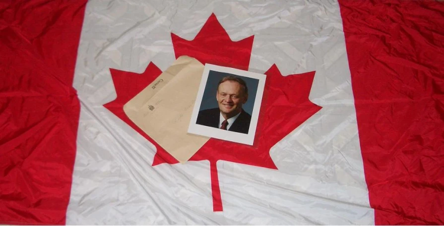 an image of a flag on a bed with a canadian po