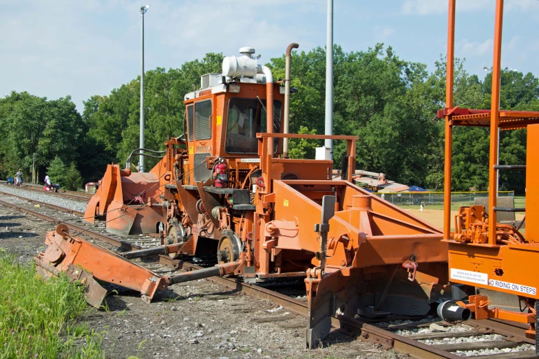 the front of a track train on its tracks