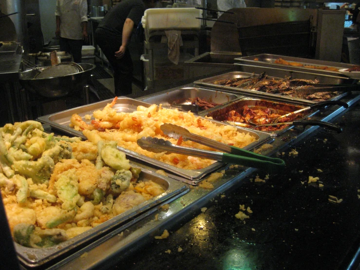 trays filled with different types of food