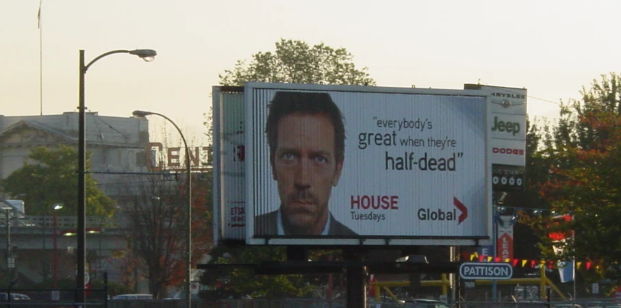 a billboard showing a person on the side