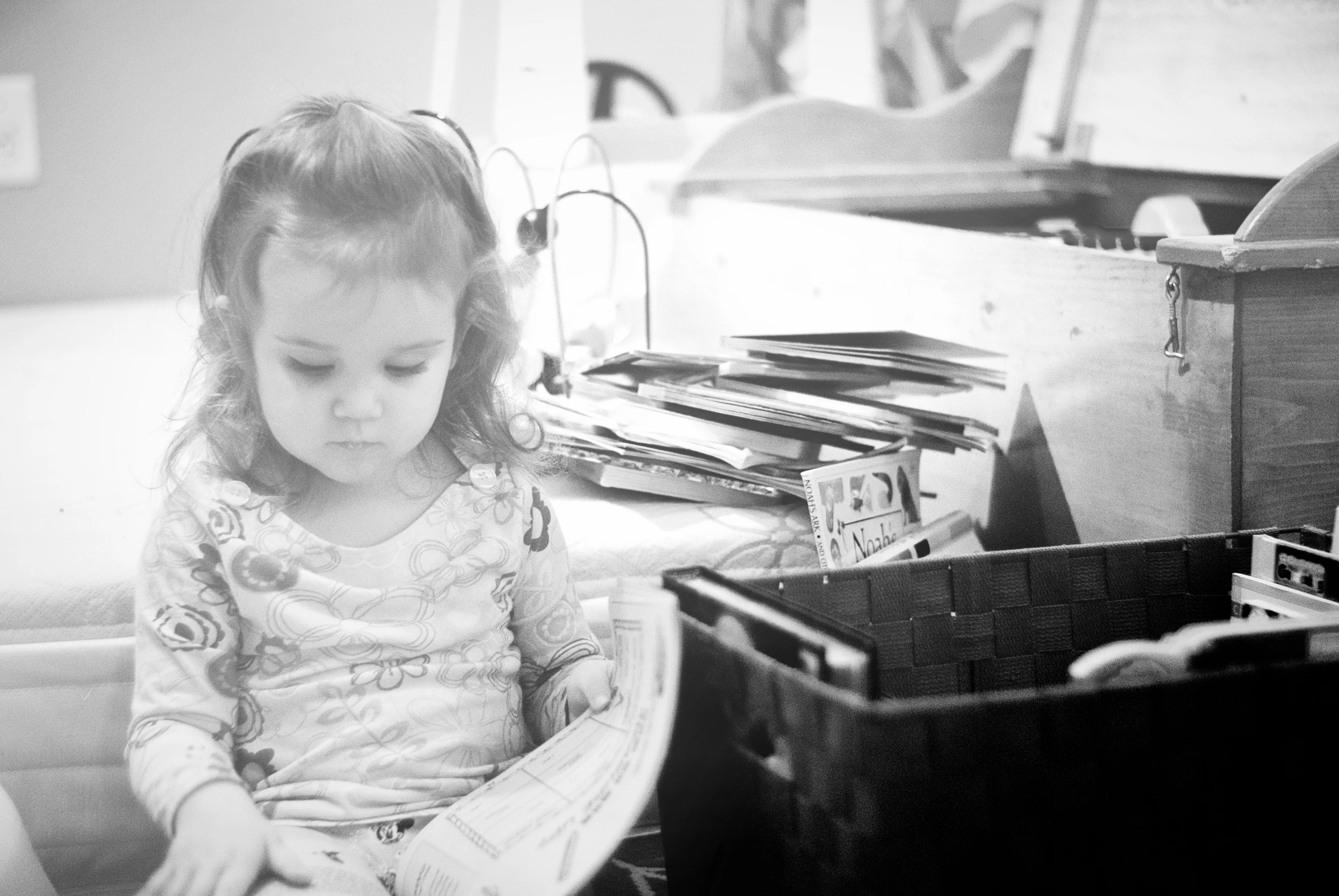 a black and white po of a little girl at work
