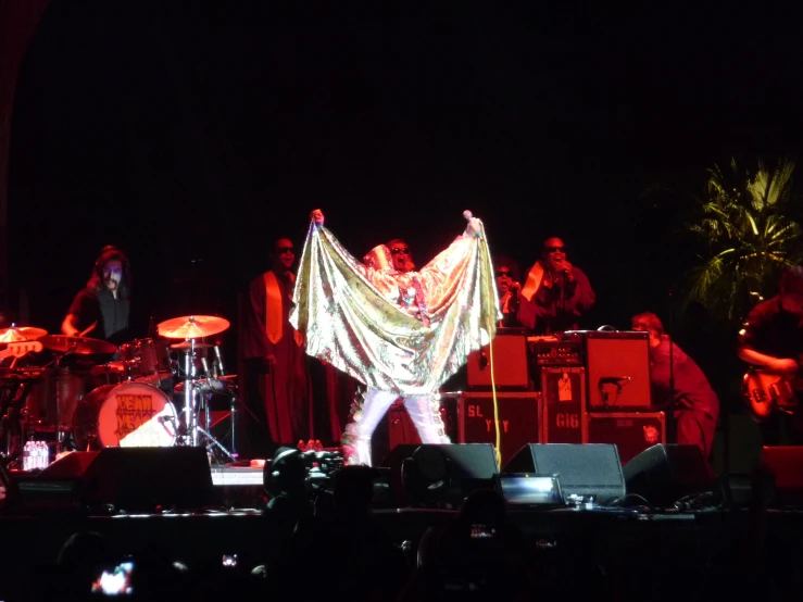 a group of people that are standing up on stage