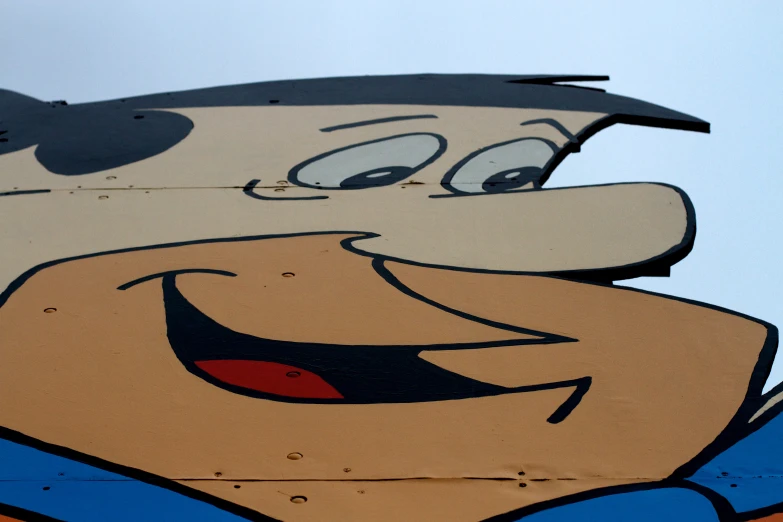 the face and nose of a smiling cartoon man