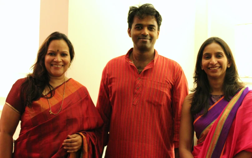 the couple are dressed in indian clothing