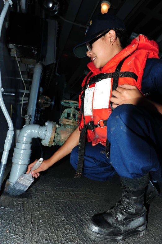 a person is working on an air duct