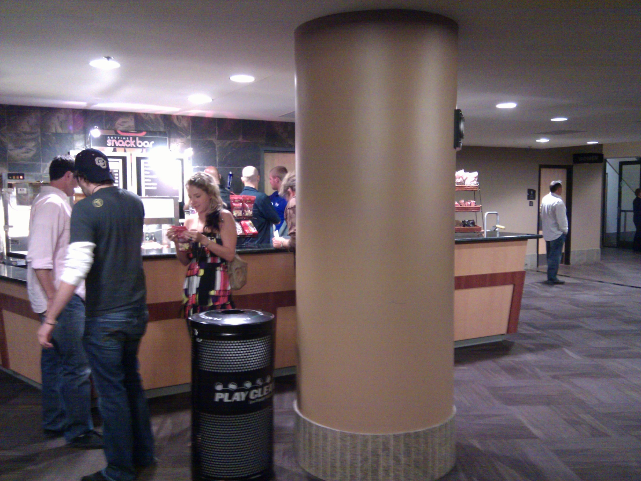 a wine glass is being used as a centerpiece in the lobby of a restaurant