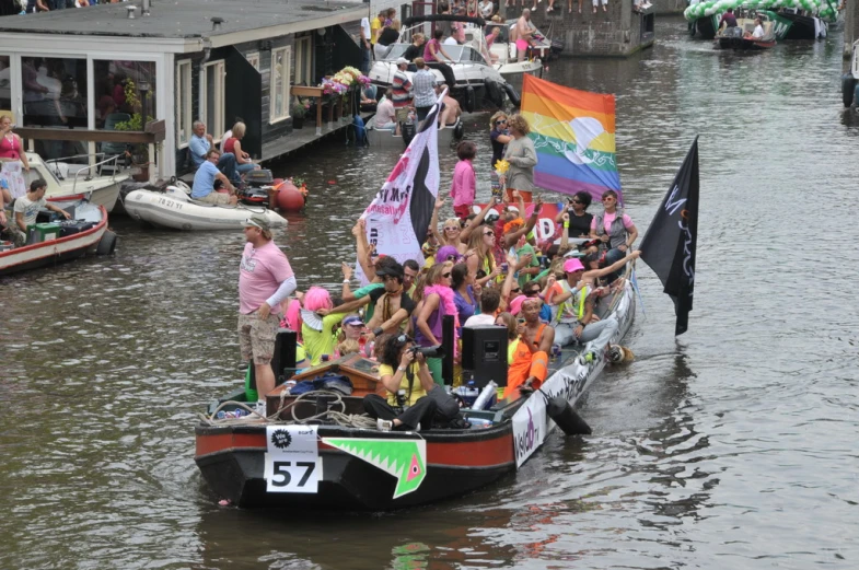 a small boat with a lot of people riding on it