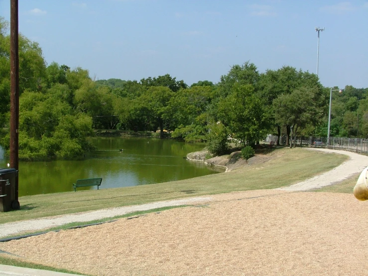 a park area near the water that is empty