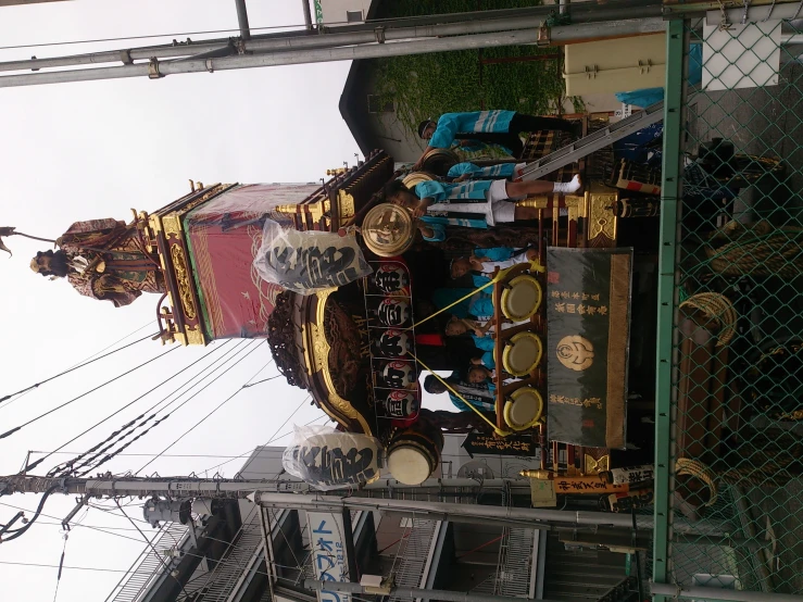 the people are looking at a decorated train