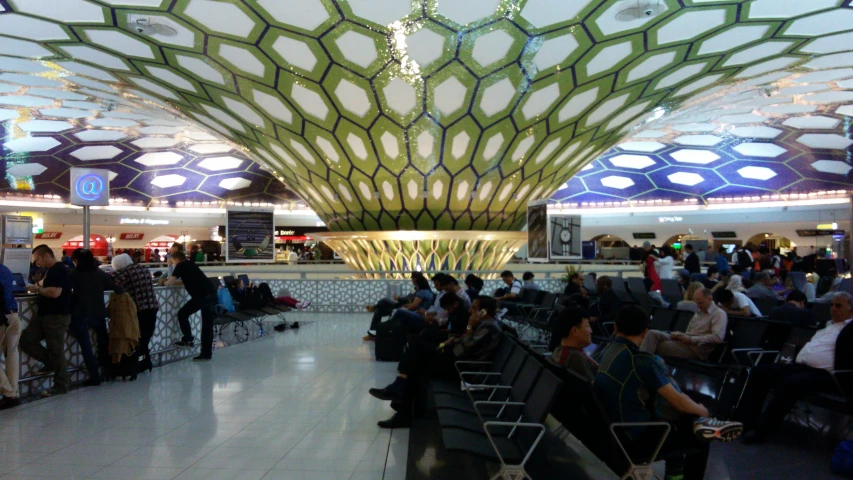 people waiting in an airport to be picked up