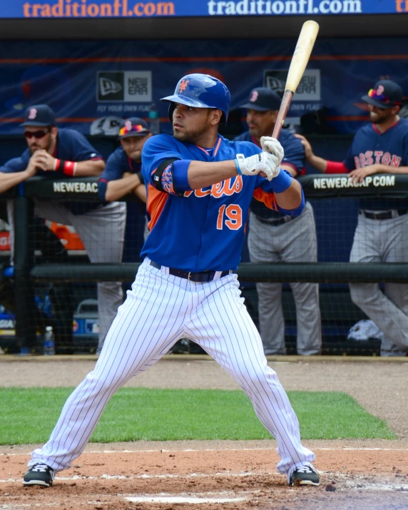 an image of baseball batter with bat in hand