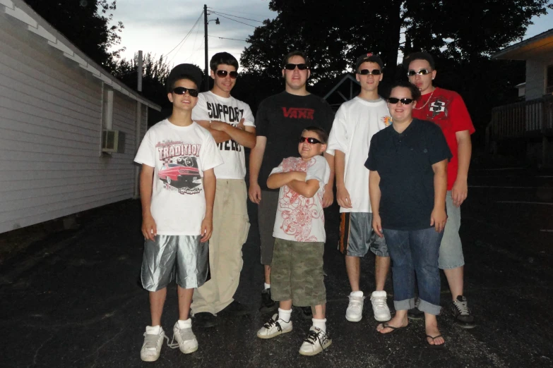 a group of people standing on a street