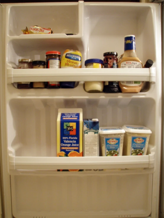 an open refrigerator showing a display of food