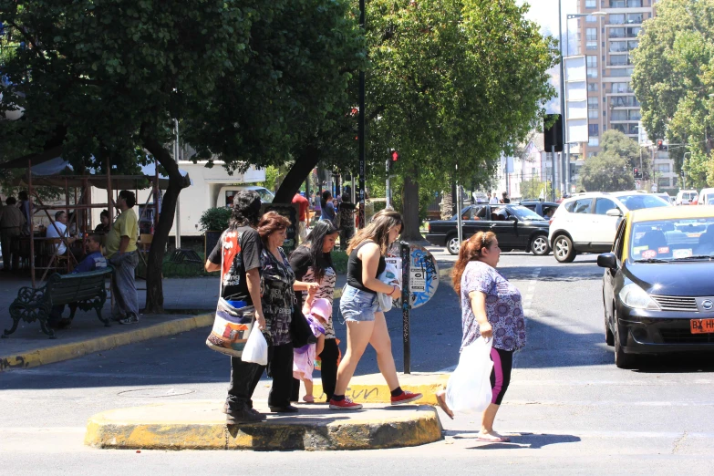 some people are standing in the middle of the street