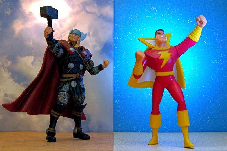 a couple of toy figurines of the same person