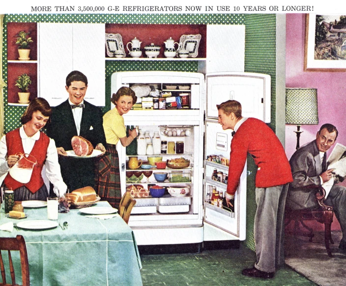 an old advertit shows a couple in their kitchen with two men and two women