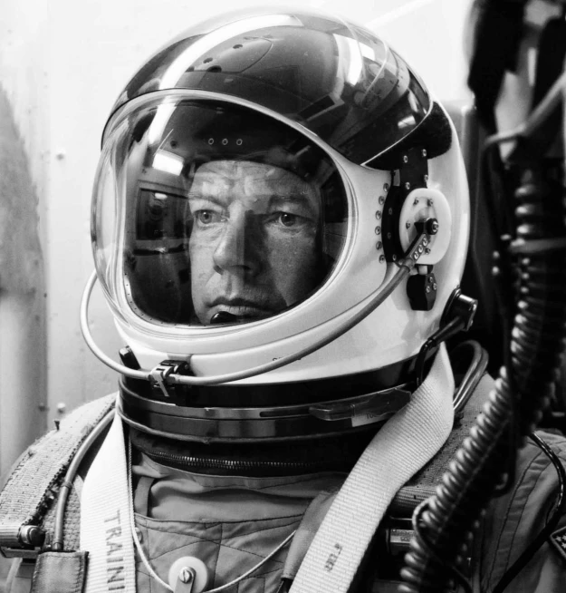 black and white pograph of man in space suit