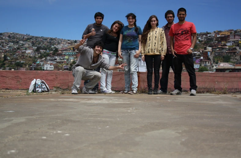 a group of young people posing for a po