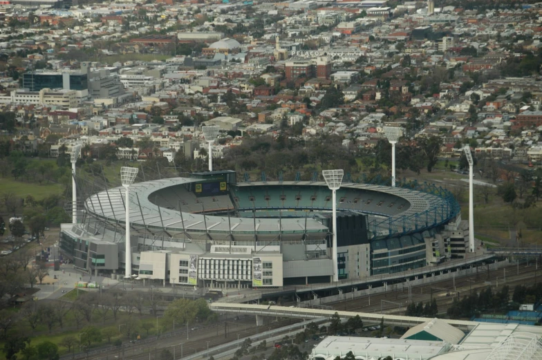 an aerial view of a soccer stadium with buildings