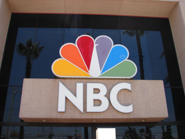 the front entrance to a building with a nbc sign on it