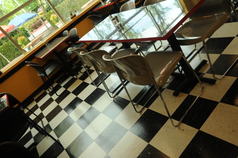 a view of a restaurant with a glass table