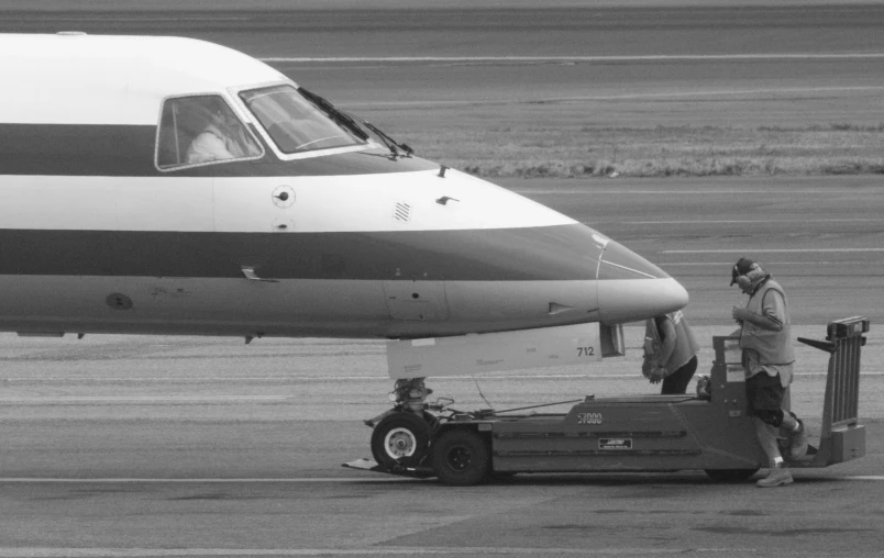 the airliner is on the runway at the airport