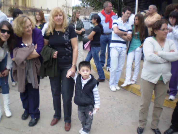 the woman and child are walking by each other