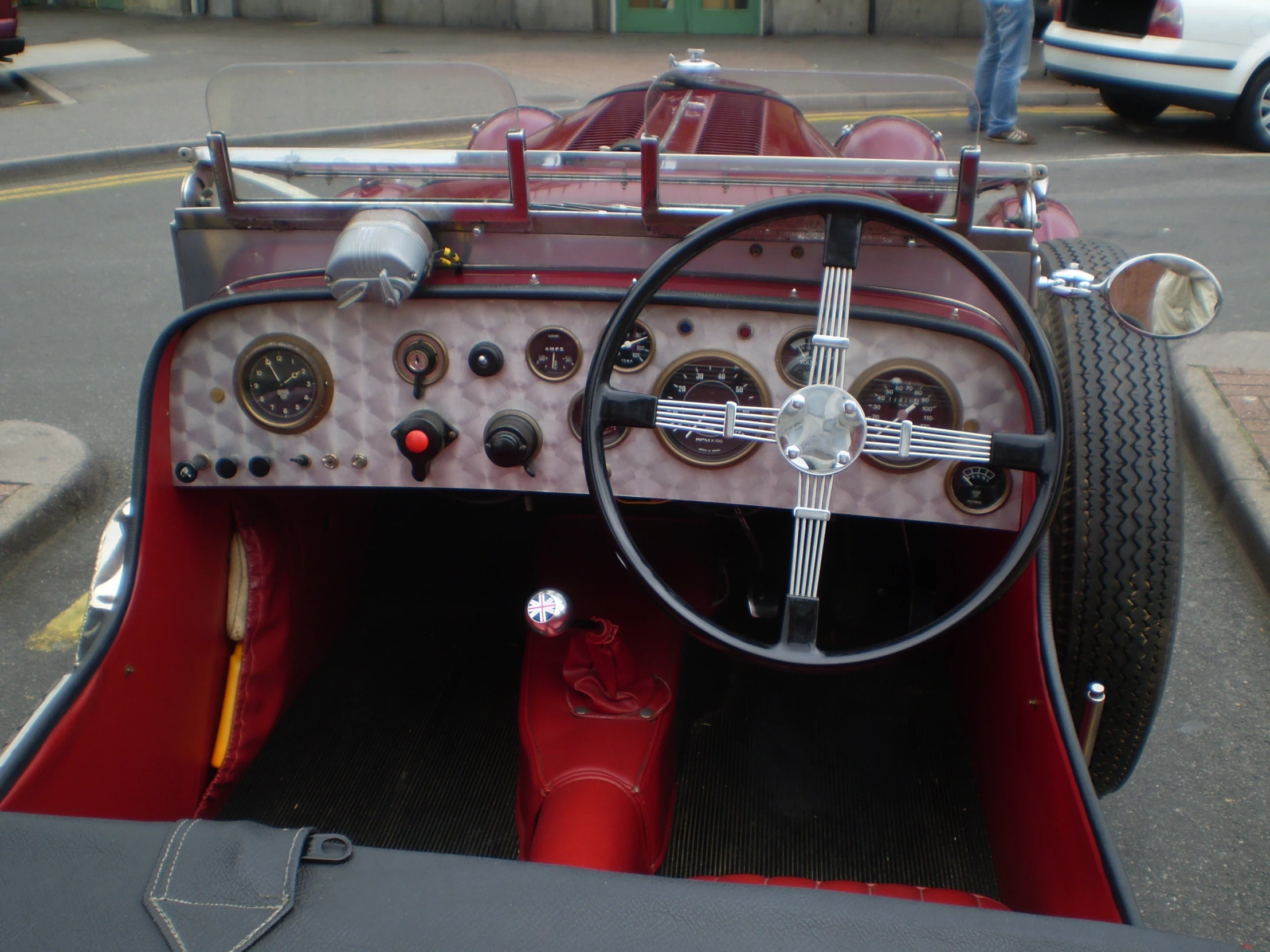 dashboard and steering wheel of an antique race car