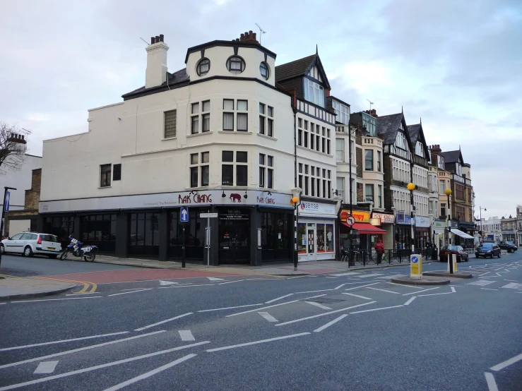 an image of a street scene from the middle of the day