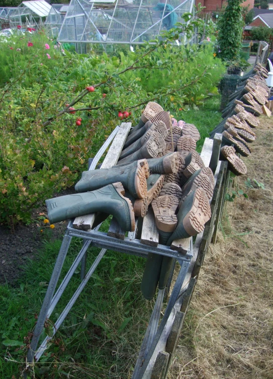 a dolly is loaded up with wood shavings and logs