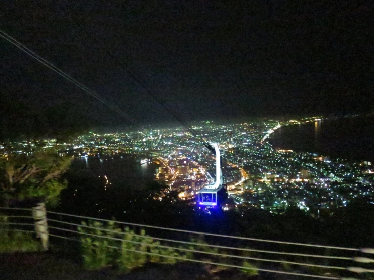 a very dark night looking over a town