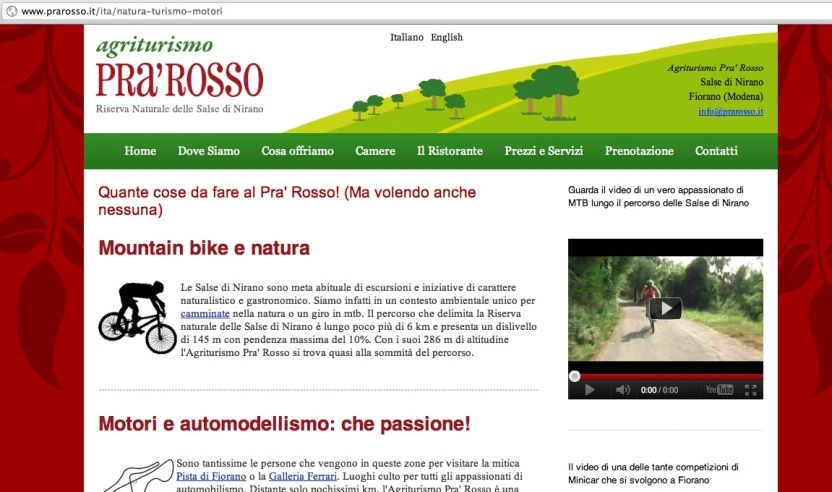 a website homepage featuring a red and green theme with images