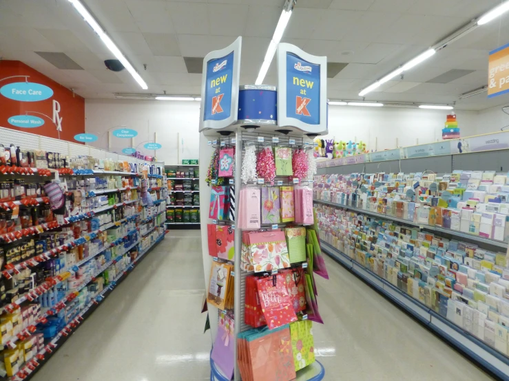 some shelves with lots of cardigans and wrapped packages