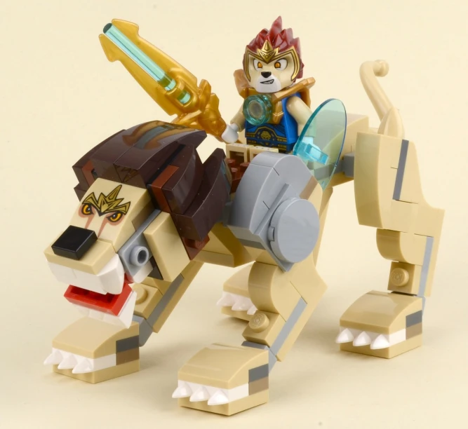 an animal - like lego figure with many guns on his head