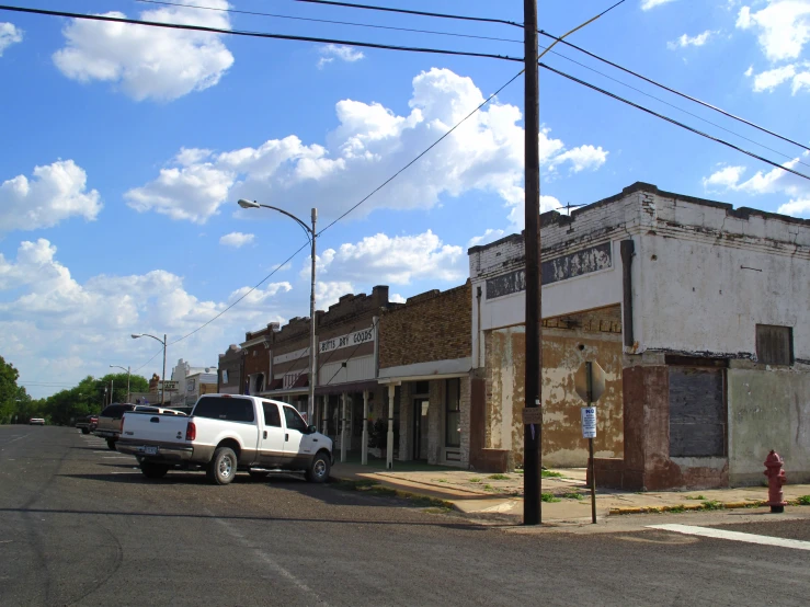 an old west western town with abandoned buildings