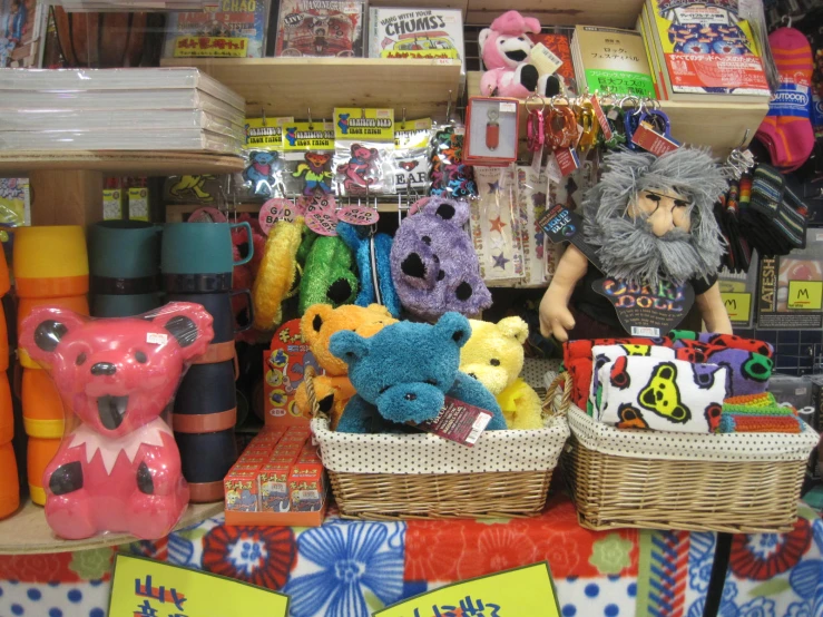 a bunch of stuff toys that are on a shelf