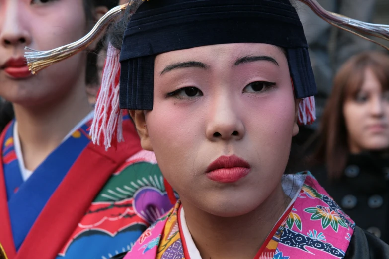 women in traditional japanese costumes dressed for the occasion