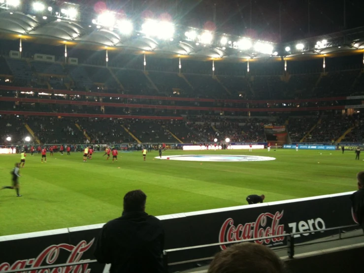 the men are playing soccer on the field