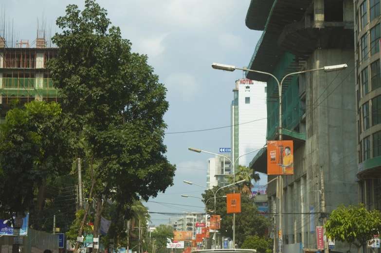 a car is parked on the side of a street near buildings