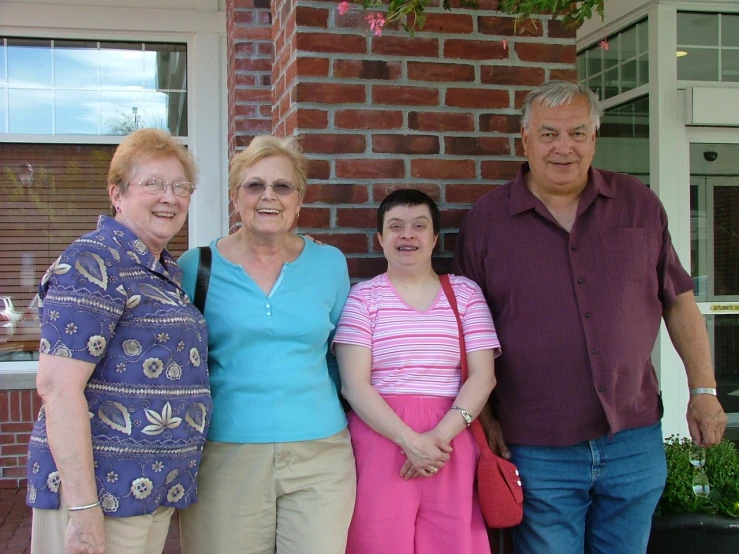 a group of people pose for a picture