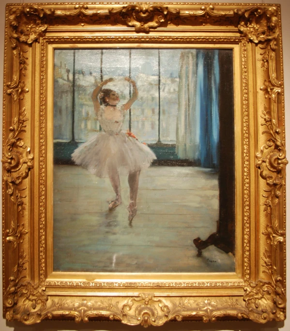 a painting of a dancer in white with a gold frame