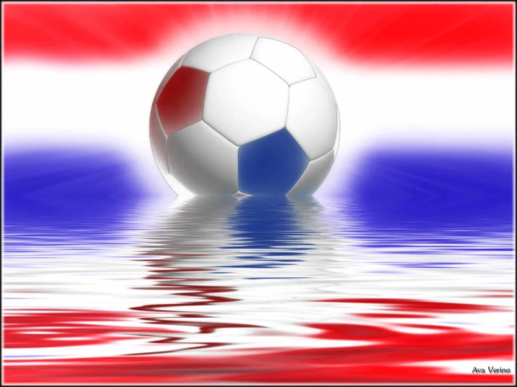 a red, white and blue soccer ball reflected in water