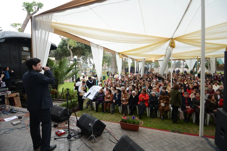 an outdoor concert in front of an audience