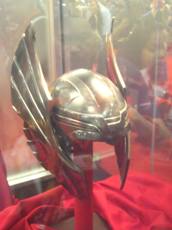 the helmet in the case is on display