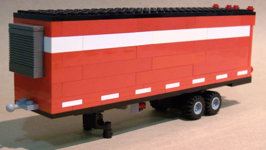 a truck made out of lego bricks in the desert