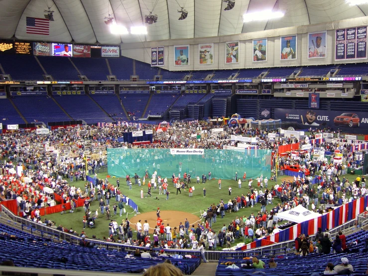 the baseball stadium is full of fans at different games