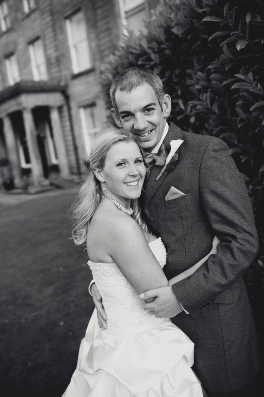 the bride and groom are posing for a po together