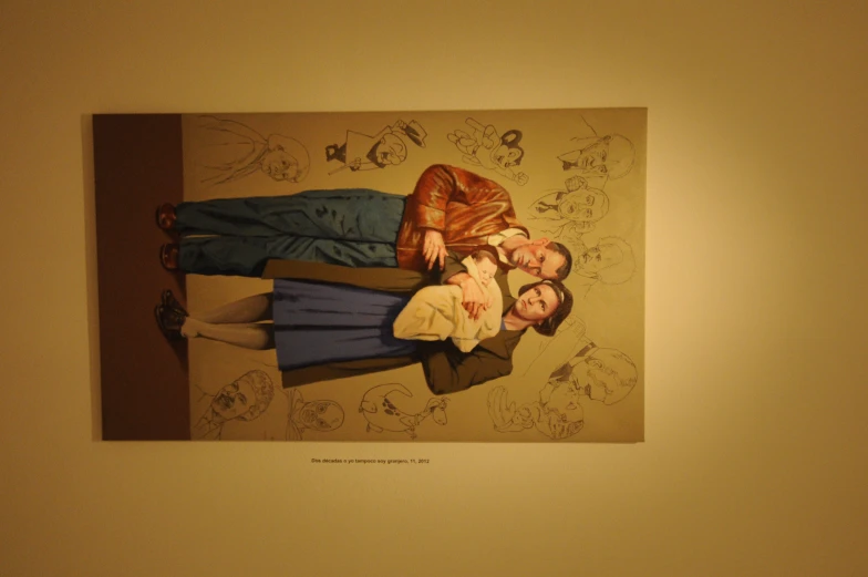 two people are hugging each other in front of a painting