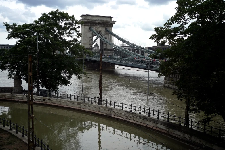 an old bridge spanning a large body of water