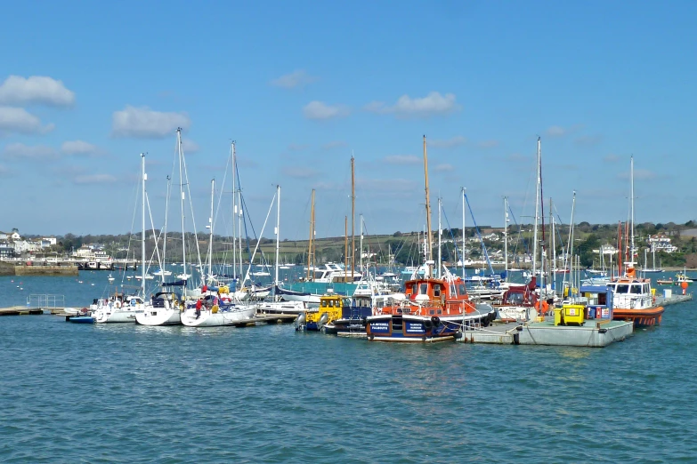 boats docked in a dock on the water